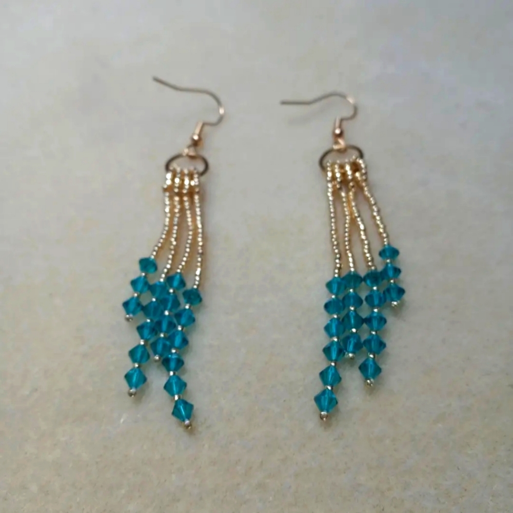 Gold and teal Swarovski earrings